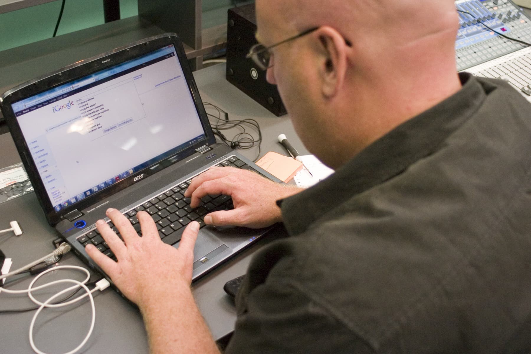 A person using a laptop to search the web